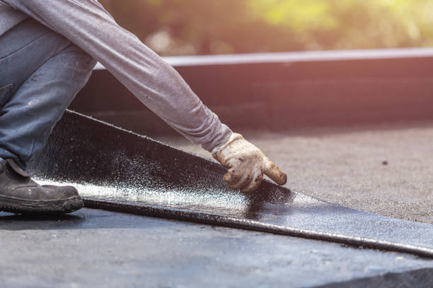 Professional Waterproofing technician working in Pewaukee, WI